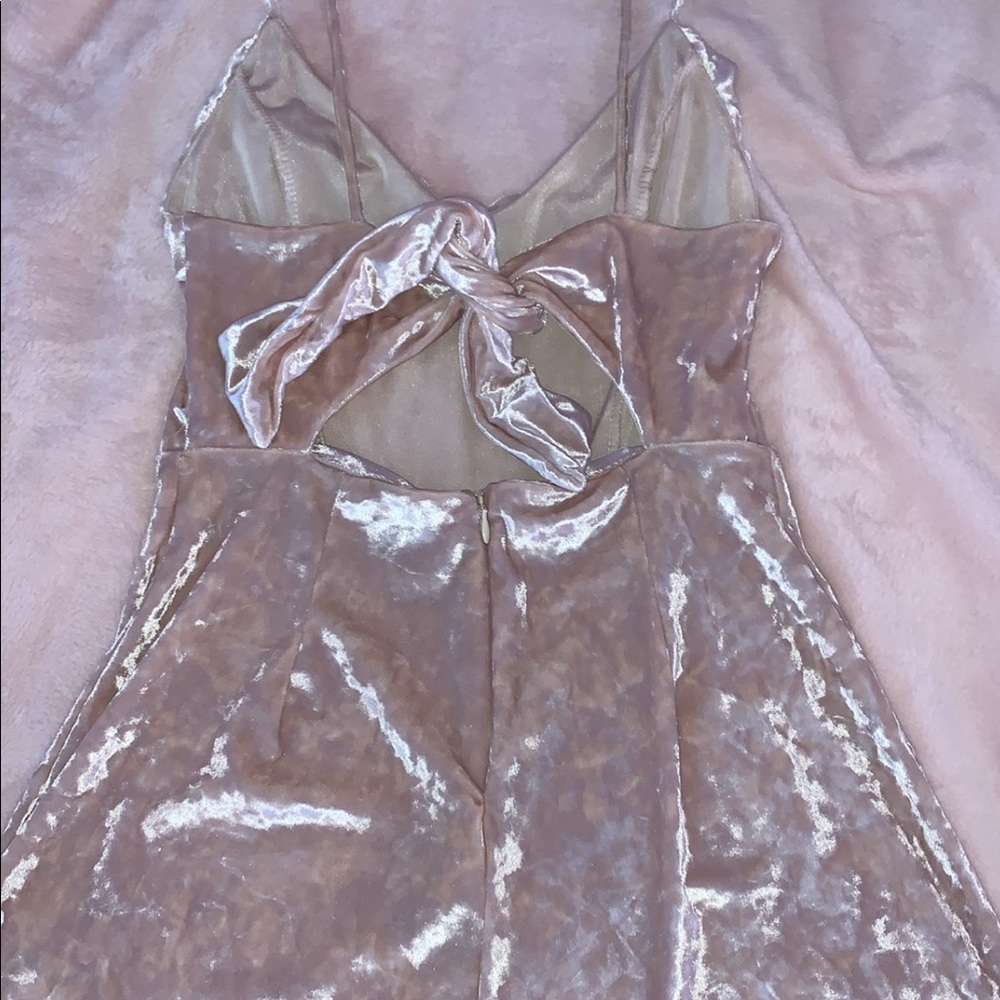 pink velvet romper from urban outfitters